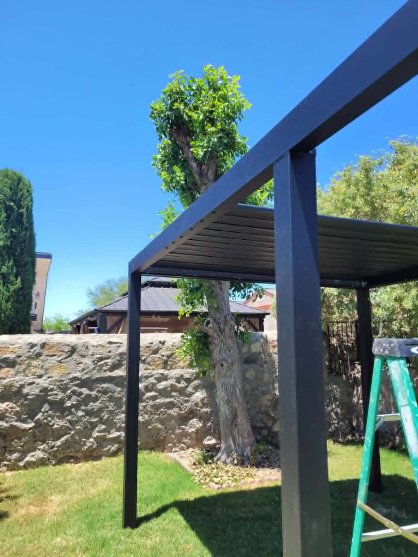 Custom steel pergola fabrication and installation in an El Paso backyard